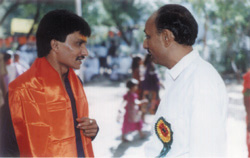 Girishbhai Trustee with Brahmin who performed enshrinement ceremony.