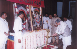 Chief Justice of Gujarat Mr Dharmadhikari lighting lamp on Bhajan Sandhya Day